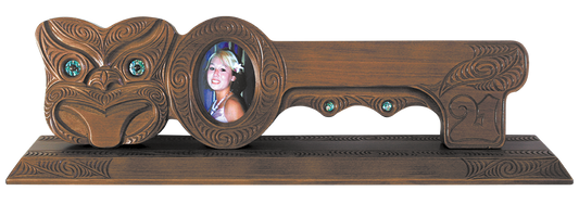 Large mask with photo frame, set on a base